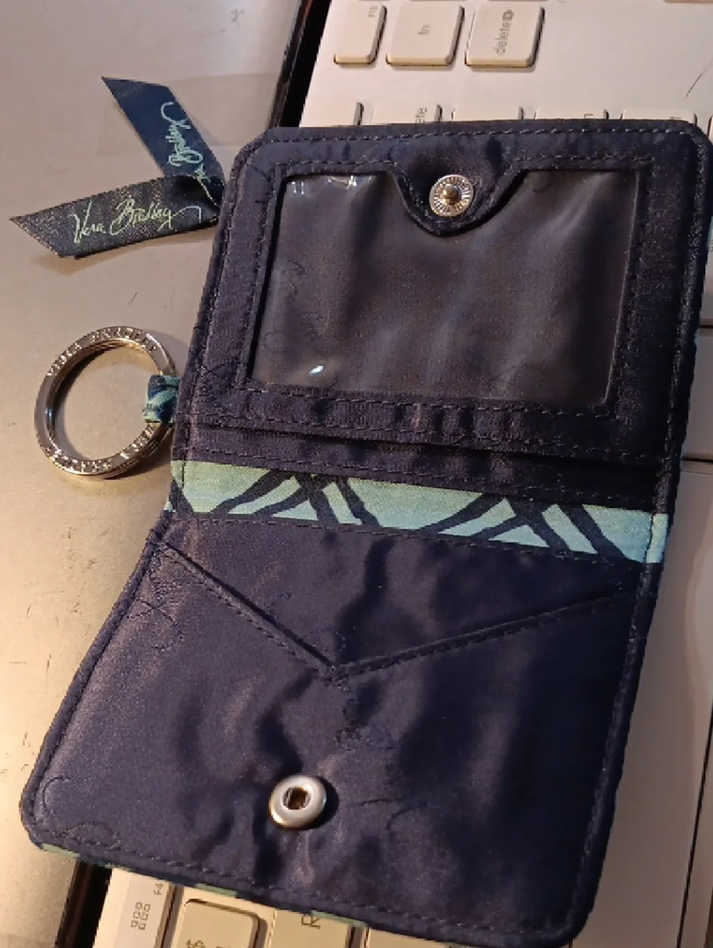 Vera Bradley Zip ID Case in a blue batik-inspired geometric pattern. - Picture 4 of 11